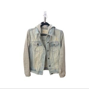 Light denim jacket with sweater sleeves and hoodie.